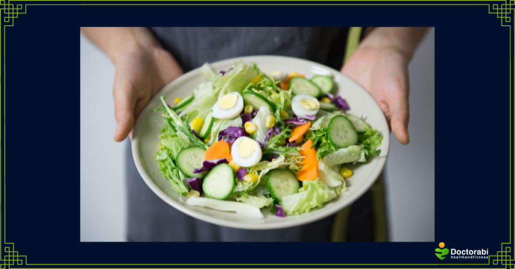 Woman-Holding-Salad-Plate