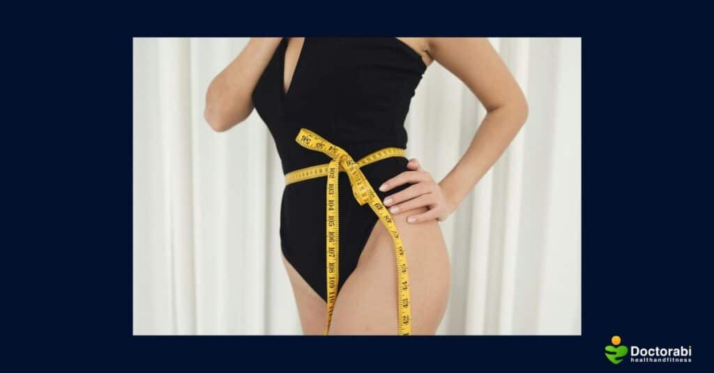 belly-with-tape-measure